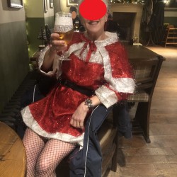 Santa's Helper Enjoying A Festive Libation